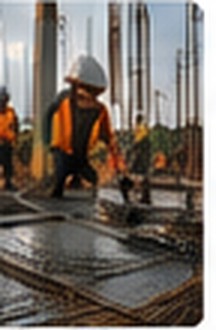 Form carpenter working on formwork at a job site